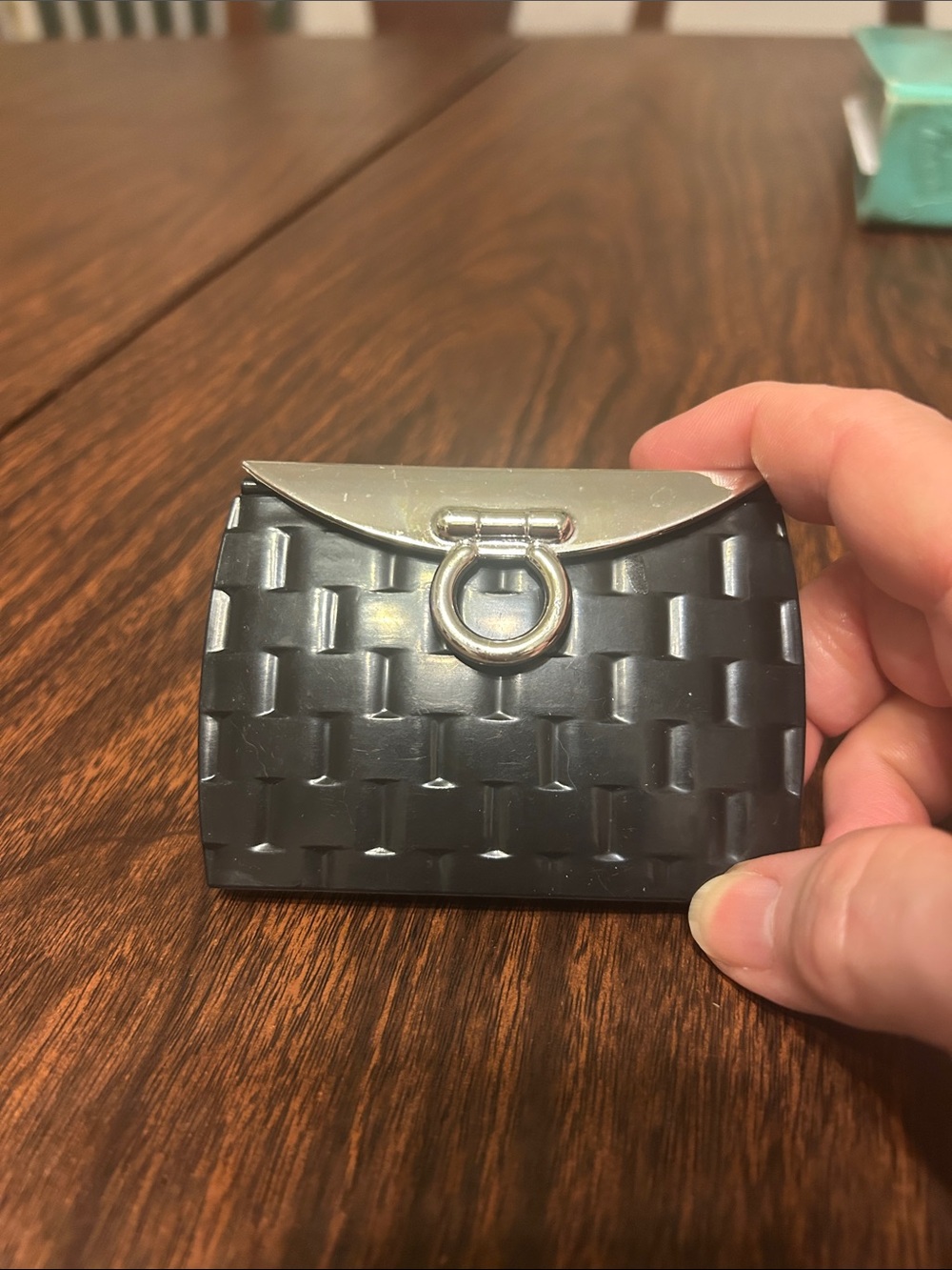 Double mirror case shaped like a purse with closure